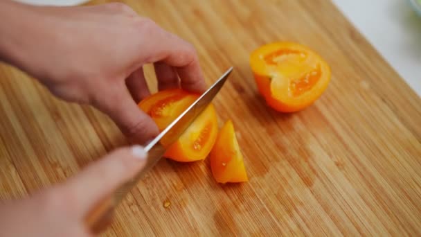High Angle View Cutting Ripe Yellow Tomato Slow Motion Knife — Stock Video