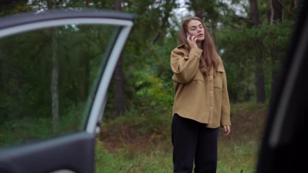 Anxious Young Woman Standing Park Broken Car Open Door Calling — Stock Video