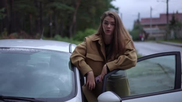 Portrait Sad Dissatisful Woman Looking Camera Talking Standing Open Car — Stok Video
