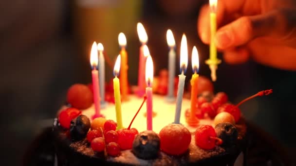 Close Male Hand Placing Burning Candle Delicious Birthday Cake Closeup — Stock Video