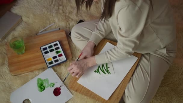 Woman Sitting Floor Draws Christmas Tree Watercolors Leisure Concept — Stock Video