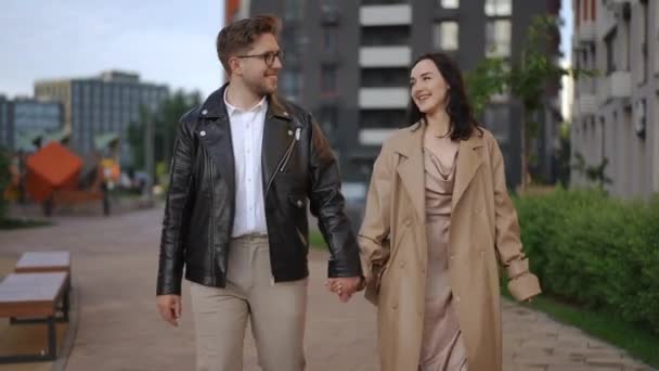 Stylish Young Couple Walks Morning City Block Holding Hands Man — Stock Video