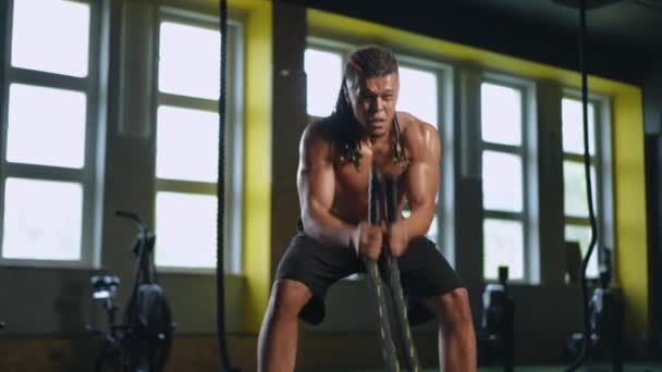 Slow Motion Mixed Race Athlete Finishes Training Battle Ropes His — Stock Video