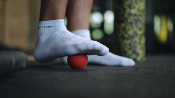 Close Mans Socked Foot Rolls Small Hard Ball His Foot — Stock Video