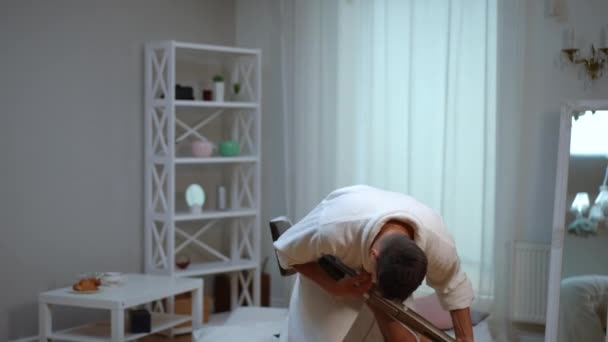 Slow Motion Cheerful Guy White Bathrobe Gives Imaginary Rock Concert — Stock Video