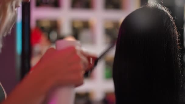 Close Woman Hairdresser Sprays Water Hairdressing Sprayer Long Female Hair — Stock Video