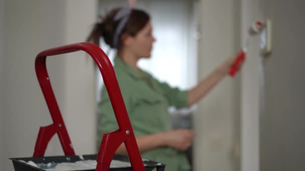 Foreground Paint Tray White Paint Sits Step Folding Ladder Out — Stock Video