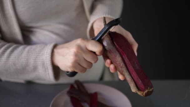 Close Unrecognizable Pregnant Woman Peels Red Beetroot Vegetable Peeler While — Stock Video