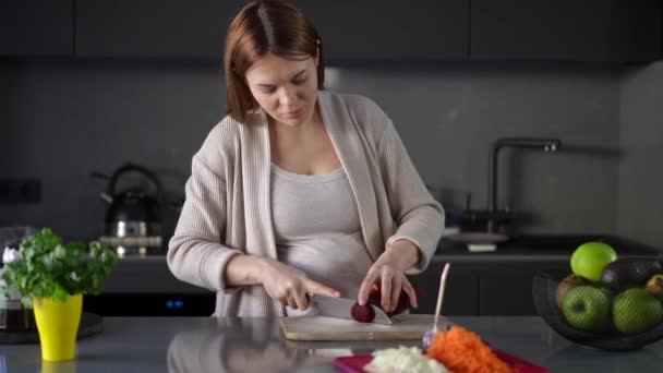 Pregnant Woman Cuts Peeled Red Beet Slices Kitchen Knife Standing Stock Footage