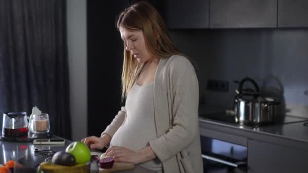 Pregnant Woman Tired While Cooking Kitchen Standing Table Woman Sighs — Stock Video