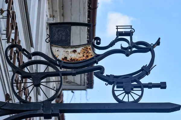 stock image Ancient  Sign Metal Carriage on Building