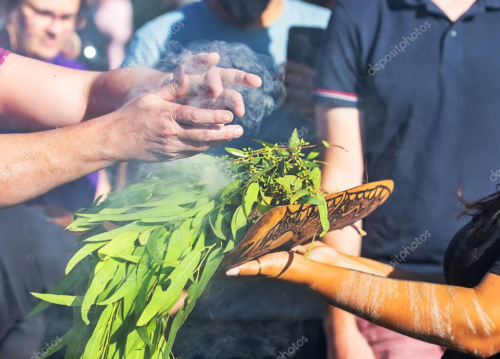 Australian Aboriginal smoking ceremony hands are