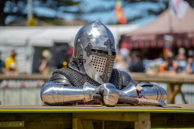 South Australia, Victor Harbor, Viking Festival: Knights in metal helmets and armor fight, a part of a costume performance at a public festival, reconstruction of knightly battles clipart