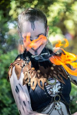 South Australia, Victor Harbor, Viking Festival: Fire performer showcasing skills with flame, participant of the local festival, a costume performance at a community event clipart