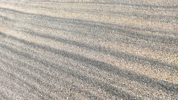 Hintergrund Aus Beigem Sand Mit Diagonalen Linien Die Sich Zum — Stockfoto