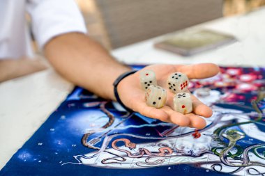 Jade Dice Zar ve Mens Hands On Game Board from Ancient Indian Game Leela, Türkiye, Alanya - 14 Nisan 2024