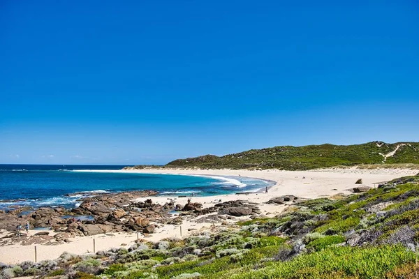Holiday makers at the idyllic beach of Prevelly, in the Margaret River region of southwest Western Australia