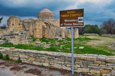 Ruins of the 14th-century monastery of Timios Stavros or Holy Cross Monastery in Anogyra, Lemesos (Limassol), Cyprus, under a dark sky clipart