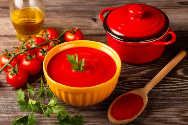 Delicious homemade tomato soup in bowl. clipart