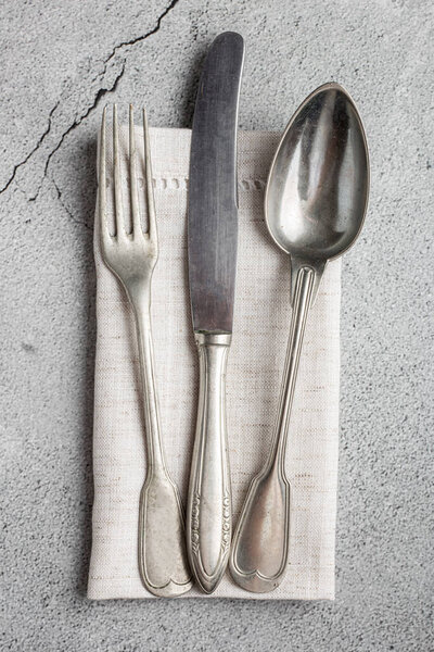 Antique cutlery on the table. Vintage cutlery.