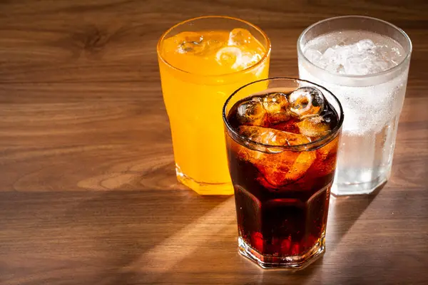 Glasses Soda Flavors Orange Lemon Coke — Stock Photo, Image