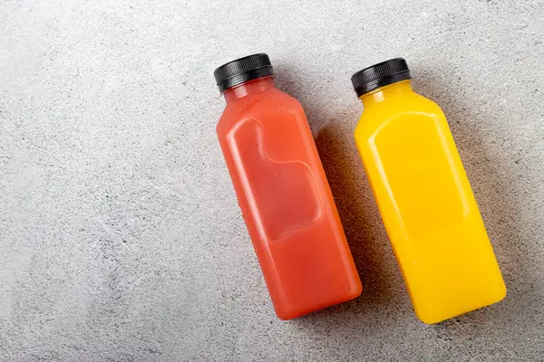Healthy Fruit Smoothies Plastic Bottles — Stock Photo, Image