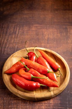 Brezilya 'da kırmızı biber kız parmağı olarak bilinir (dedo de moa)