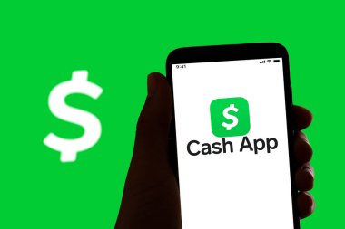 Çevrimiçi ödeme ve bankacılık uygulaması Cash App logosu 6 Temmuz 2022 'de İspanya' nın Barcelona kentindeki bir cep telefonunun ekranında görülüyor.