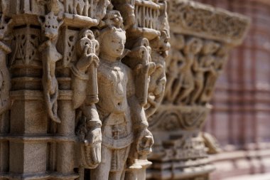 Hutheesing Jain Temple in Ahmenabad, Gujarat, India. Example of ancient sacred jain temple in Maru-Gujarat architecture style clipart