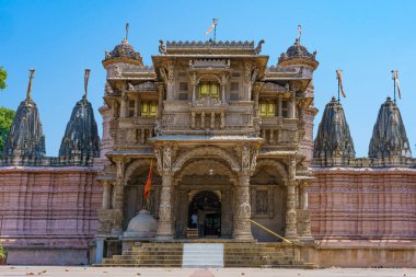 Hutheesing Jain Temple in Ahmenabad, Gujarat, India. Example of ancient sacred jain temple in Maru-Gujarat architecture style clipart