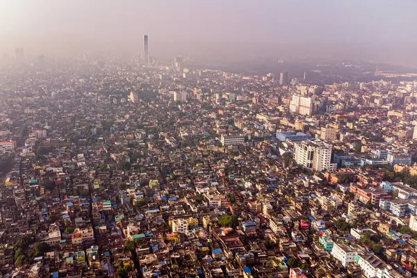 stock image Aerial view of Kolkata at sunrise, capital city of West Bengal abd major Indian metropolis, also known as Calcutta. Panoramic drone shot of the old city center.