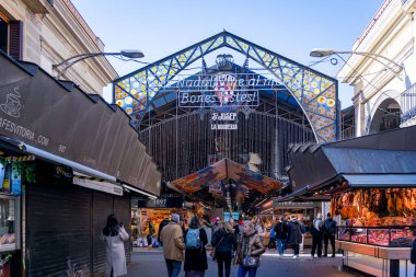 Barcelona, Spain - 20 January 2025: people and tourists are seen in the landmark Mercat de Sant Josep de la Boqueria, a famous historic market and tourist attraction in the city center clipart