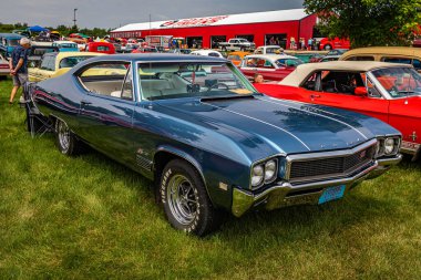 Iola, WI - July 07, 2022: High perspective front corner view of a 1968 Buick Skylark GS 400 Hardtop Coupe at a local car show.