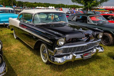 Iola, WI - July 07, 2022: High perspective front corner view of a 1956 Chevrolet BelAir 2 Door Sedan at a local car show.