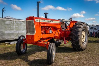 Fort Meade, FL - February 24, 2022: Low perspective front corner view of a 1963 Allis-Chalmers D19 Diesel Tractor at a local tractor show.
