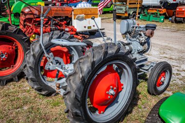 Fort Meade, FL - February 24, 2022: High perspective rear corner view of a 1947 Gibson Model D Garden Tractor at a local tractor show.