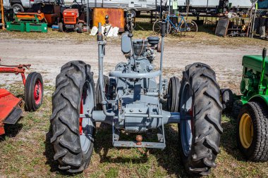 Fort Meade, FL - February 24, 2022: High perspective rear view of a 1947 Gibson Model D Garden Tractor at a local tractor show.