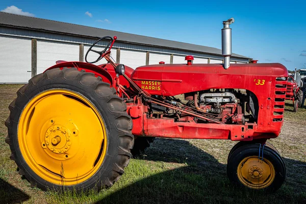 stock image Fort Meade, FL - February 26, 2022: High perspective side view of a 1948 Massey Harris GA 33 Tractor at a local tractor show.