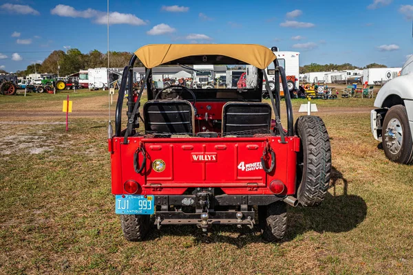 stock image Fort Meade, FL - February 26, 2022: High perspective rear view of a 1959 Willys Jeep CJ-3B at a local car show.