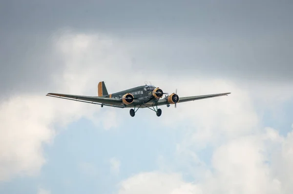 Low Angle Shot Old Airplane Flying Cloudy Sky Daytime Royalty Free Stock Photos