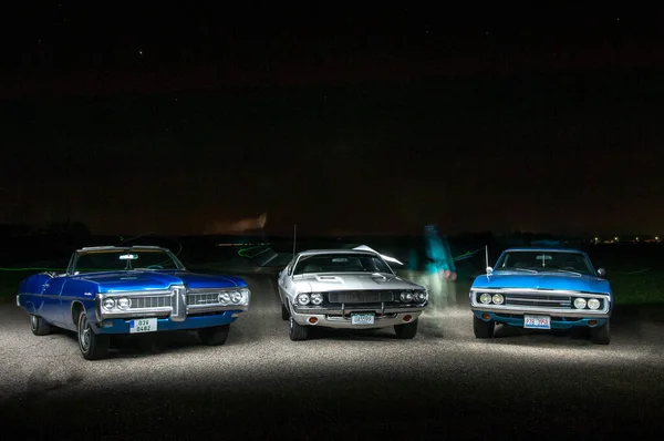 Три Машини Вночі — стокове фото