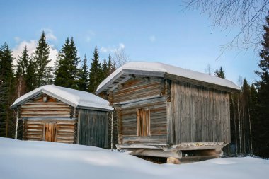 Old food storage sheds. The old Huhtala museum farm. The farm was established in the 1700s. Isojaervi National Park in Finland.