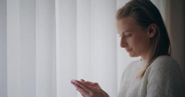 Modern Woman Browsing Social Media Texting Shopping Online Using Smartphone