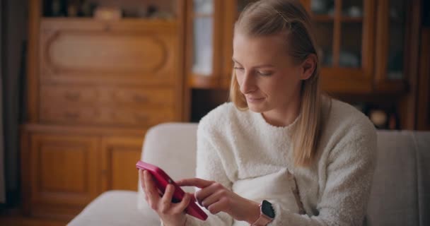 Modern Woman Browsing Social Media Texting Shopping Online Using Smartphone — Stockvideo