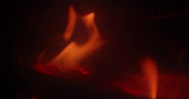 Close up Fireplace. Wood Burning In Fireplace Heating Season.