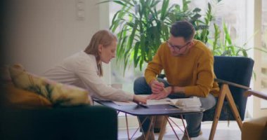 Real Estate Agent Talking with Client Business Meeting. Finalizing Home Purchase Transaction.