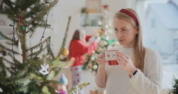Portrait of Woman Drinking Christmas Tea