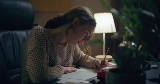 Portrait Contemplative Woman Writing Letter Desk — Stock Video