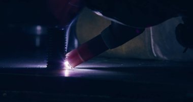 Close Up Of Bright Welding Sparks Welding Metal Parts At Steel Construction Industrial Workshop