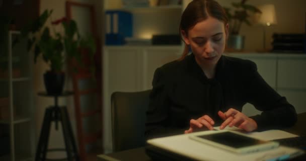 Worried Businesswoman Calculating Budget While Working Late Alone Office — Stock Video